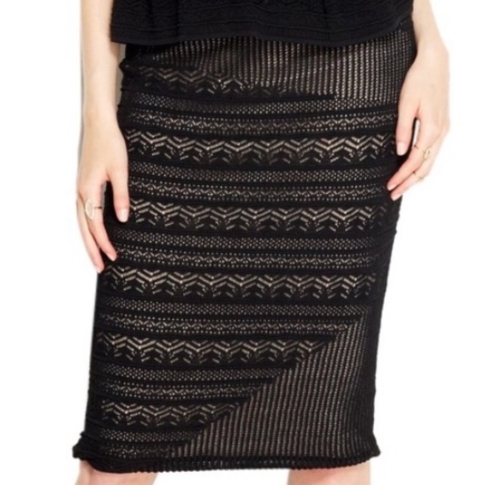 “Rachel Roy” black pencil knee- length skirt.
